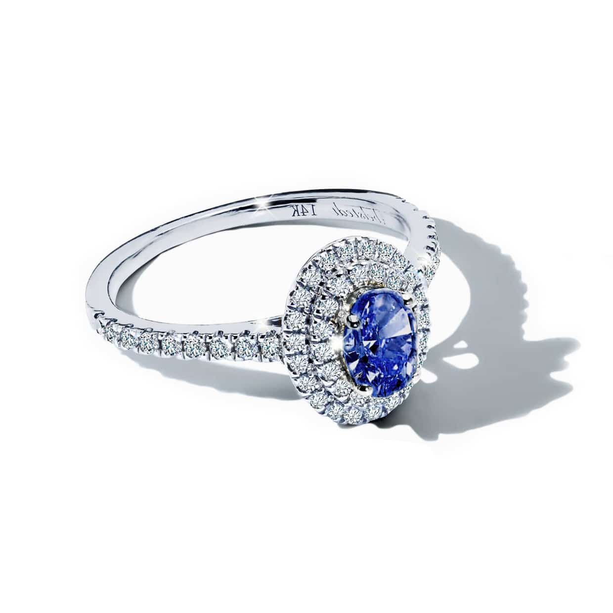 Winston forlovelsesring med blå oval safir og dobbelt diamant halo